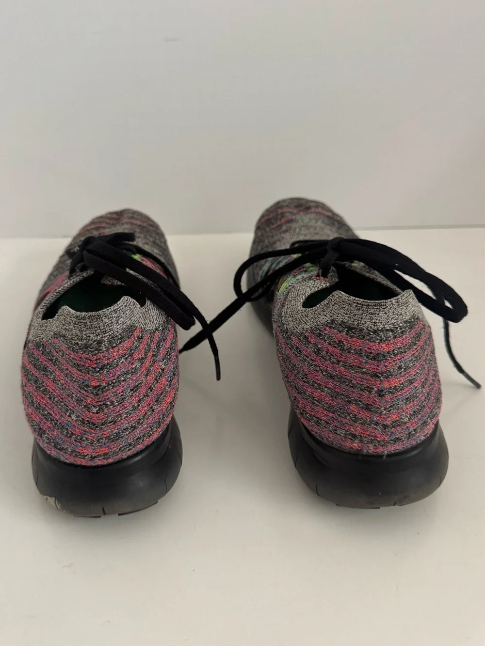 Nike Women’s Gray Knit Running Shoes with Pink and Green Accents